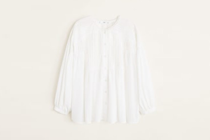 Blusa blanca con mangas abotonadas de Mango