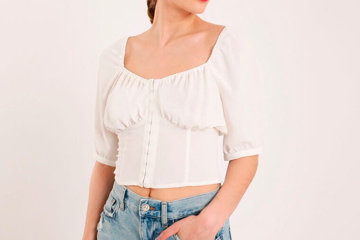 Blusa blanca tipo corsé de Pimkie