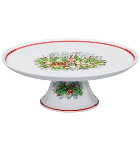 Agradável surpresa | Ideal para servir o bolo rei, esta peça parece extra simples quando chega à mesa e, depois do bolo comido, revela-se tão divertida quanto elegante. | Prato com pé, Vista Alegre, 47€