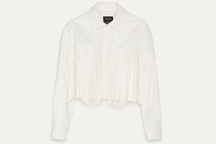 Chaqueta blanca con flecos de Bershka