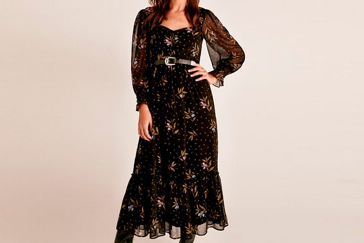 Vestido negro largo con transparencias de Cortefiel