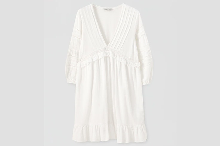 Vestido blanco con escote de pico y bordados maria pombo